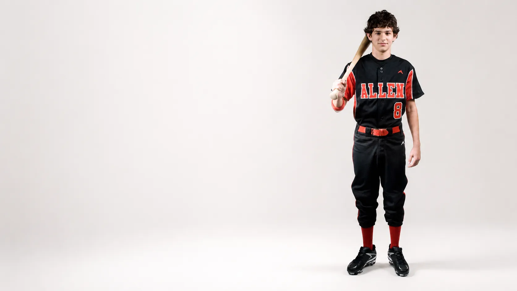 Baseball player in a custom Allen Sportswear uniform