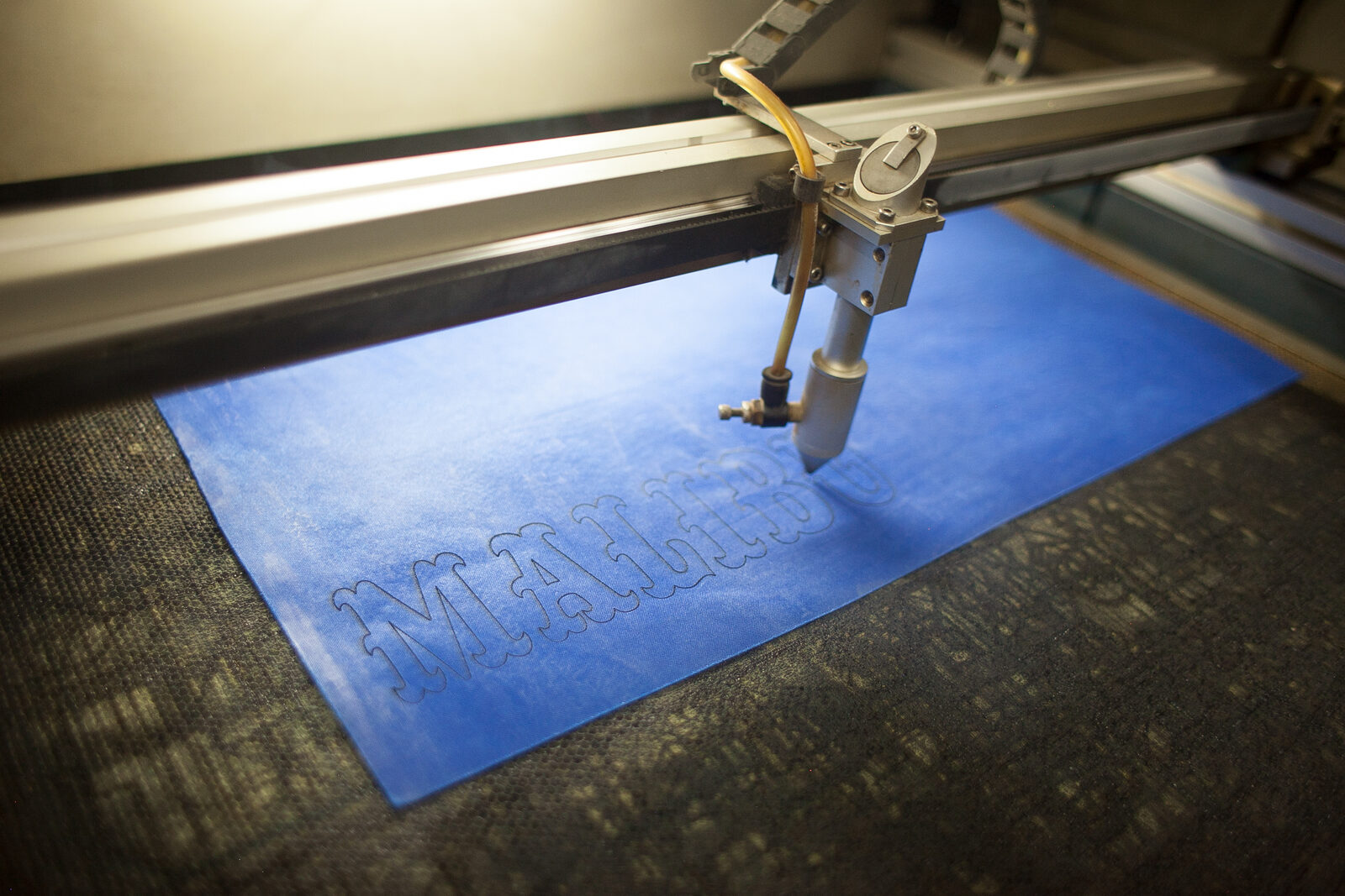 CNC cutter in operation at Allen Sportswear