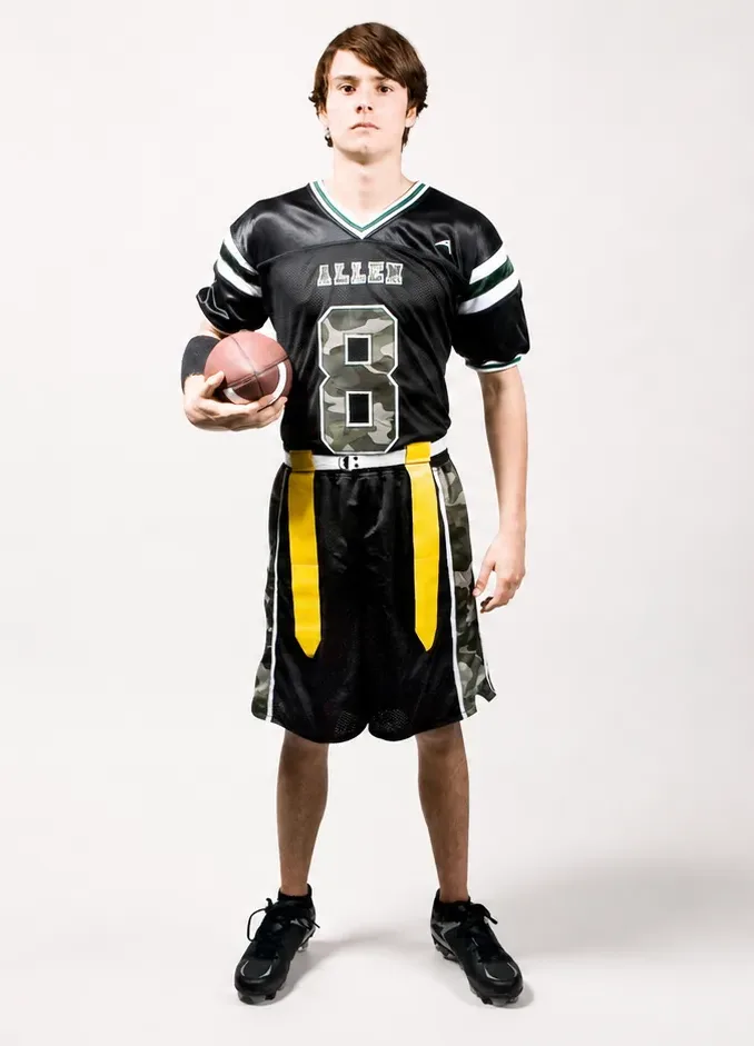 Flag football player in a custom Allen Sportswear uniform