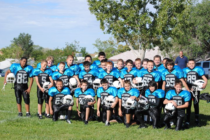 Storm youth football team in custom Allen Sportswear uniforms